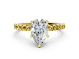 Yellow gold Pear Cut Diamond Solitaire Ring with Pavé Band and Four-Prong Setting