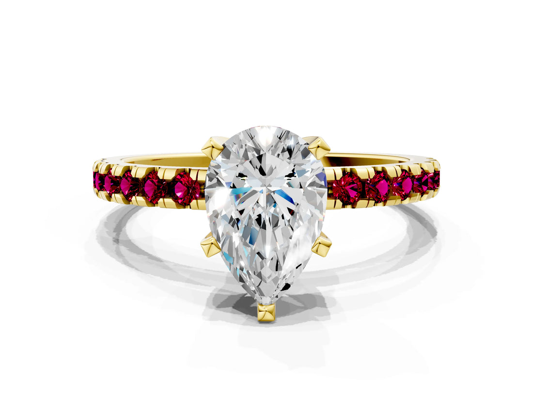Yellow gold Pear Cut Diamond Solitaire Ring with Pavé Band and Four-Prong Setting