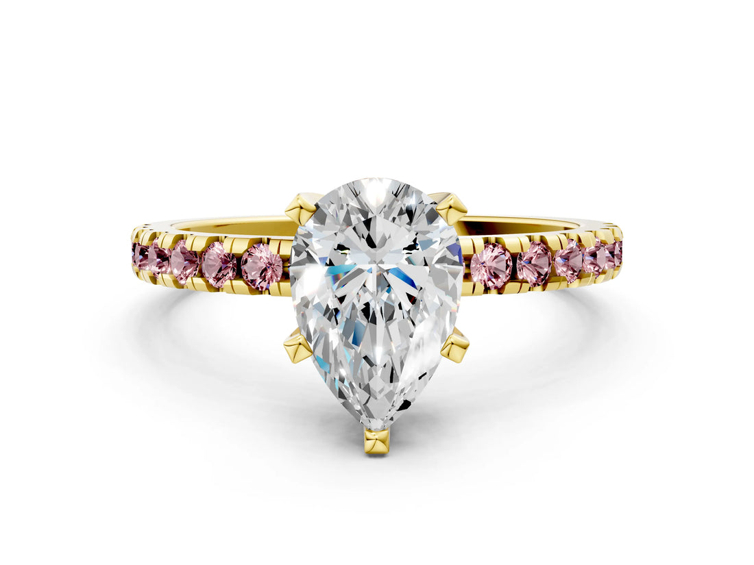 Yellow gold Pear Cut Diamond Solitaire Ring with Pavé Band and Four-Prong Setting