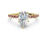 Yellow gold Pear Cut Diamond Solitaire Ring with Pavé Band and Four-Prong Setting