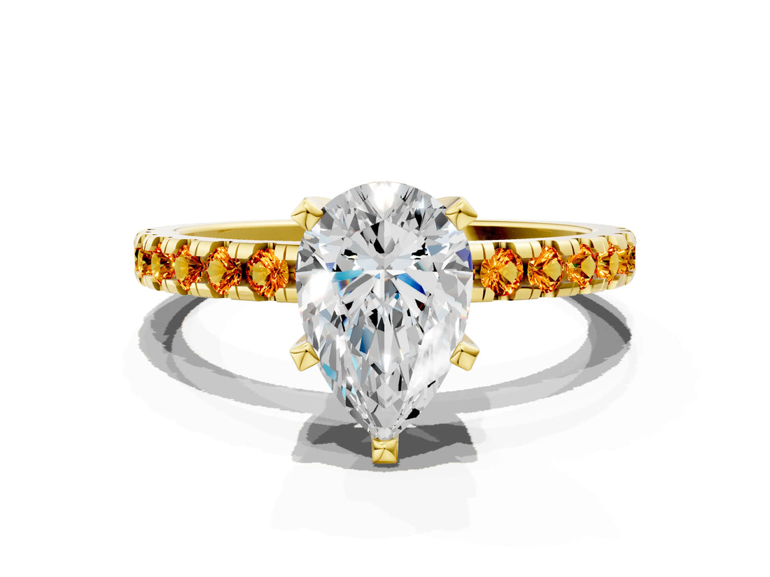 Yellow gold Pear Cut Diamond Solitaire Ring with Pavé Band and Four-Prong Setting