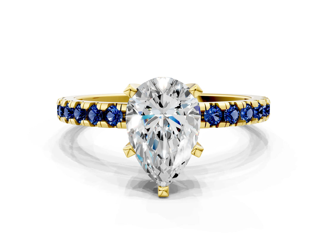 Yellow gold Pear Cut Diamond Solitaire Ring with Pavé Band and Four-Prong Setting