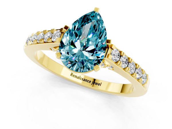 Yellow gold Pear Cut Blue Topaz Solitaire Ring with Crossover Gallery and Round  Pavé Band