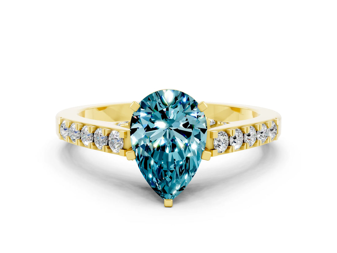 Yellow gold Pear Cut Diamond Solitaire Ring with Pavé Band and Prong Setting