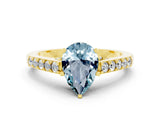 Yellow gold Pear Cut Diamond Solitaire Ring with Pavé Band and Prong Setting