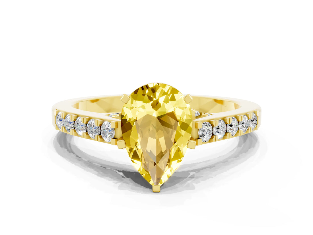 Yellow gold Pear Cut Diamond Solitaire Ring with Pavé Band and Prong Setting
