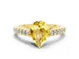 Yellow gold Pear Cut Diamond Solitaire Ring with Pavé Band and Prong Setting