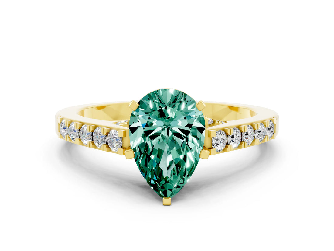 Yellow gold Pear Cut Diamond Solitaire Ring with Pavé Band and Prong Setting