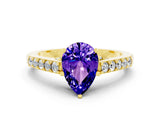 Yellow gold Pear Cut Diamond Solitaire Ring with Pavé Band and Prong Setting