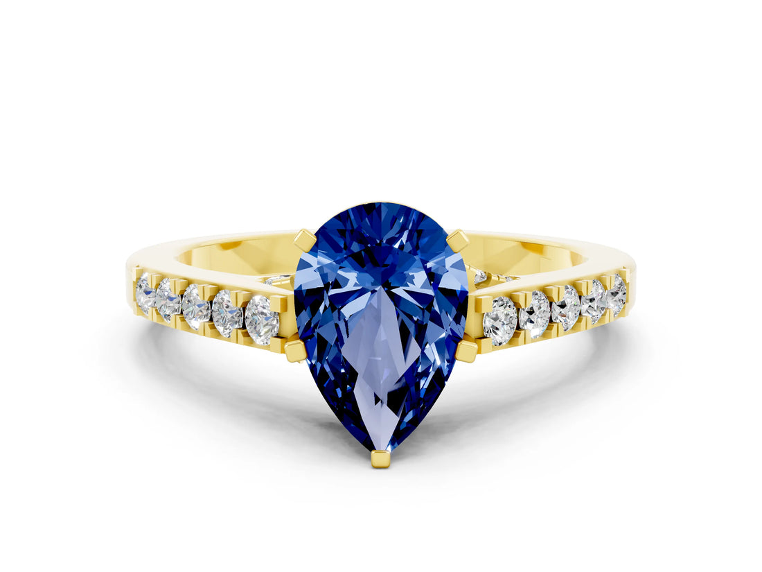 Yellow gold Pear Cut Diamond Solitaire Ring with Pavé Band and Prong Setting