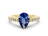 Yellow gold Pear Cut Diamond Solitaire Ring with Pavé Band and Prong Setting