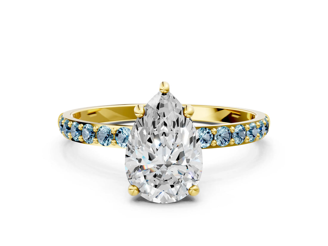 Yellow gold Pear Cut Diamond Solitaire Ring with Round with Aquamarine side stone Pavé Band and Prong Setting_24