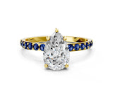 Yellow gold Pear Cut Diamond Solitaire Ring with Round with Blue Sapphire side stone Pavé Band and Prong Setting_12