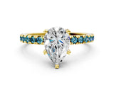 Yellow gold Pear Cut Diamond Solitaire Ring with Round with Blue Topaz side stone Pavé Band and Four-Prong Setting_36