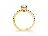 Yellow gold Pear Cut Diamond Solitaire Ring with Round with Blue Topaz side stone Pavé Band and Four-Prong Setting_39