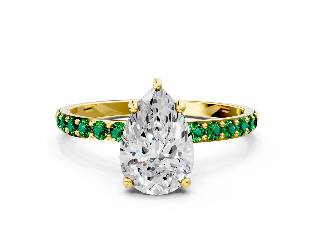Yellow gold Pear Cut Diamond Solitaire Ring with Round with Emerald side stone Pavé Band and Prong Setting_24