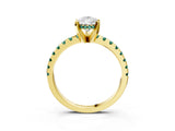 Yellow gold Pear Cut Diamond Solitaire Ring with Round with Green Sapphire side stone Pavé Band and Four-Prong Setting_39