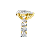 Yellow gold Pear Cut Diamond Solitaire Ring with Shared Prong Pavé Band and Four-Prong Setting_89