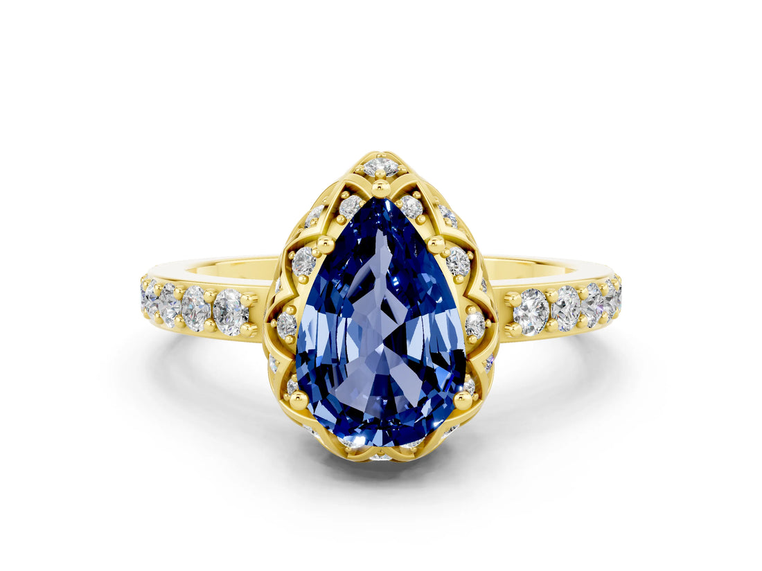 Yellow gold Pear Cut Diamond Solitaire Ring with Shared Prong Pavé Band