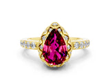 Yellow gold Pear Cut Diamond Solitaire Ring with Shared Prong Pavé Band