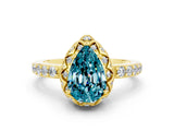 Yellow gold Pear Cut Diamond Solitaire Ring with Shared Prong Pavé Band