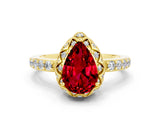 Yellow gold Pear Cut Diamond Solitaire Ring with Shared Prong Pavé Band
