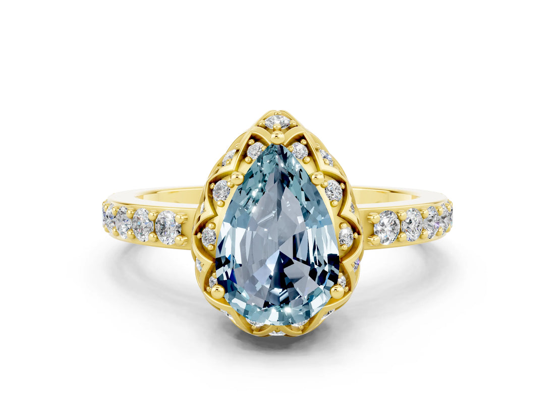 Yellow gold Pear Cut Diamond Solitaire Ring with Shared Prong Pavé Band