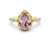 Yellow gold Pear Cut Diamond Solitaire Ring with Shared Prong Pavé Band
