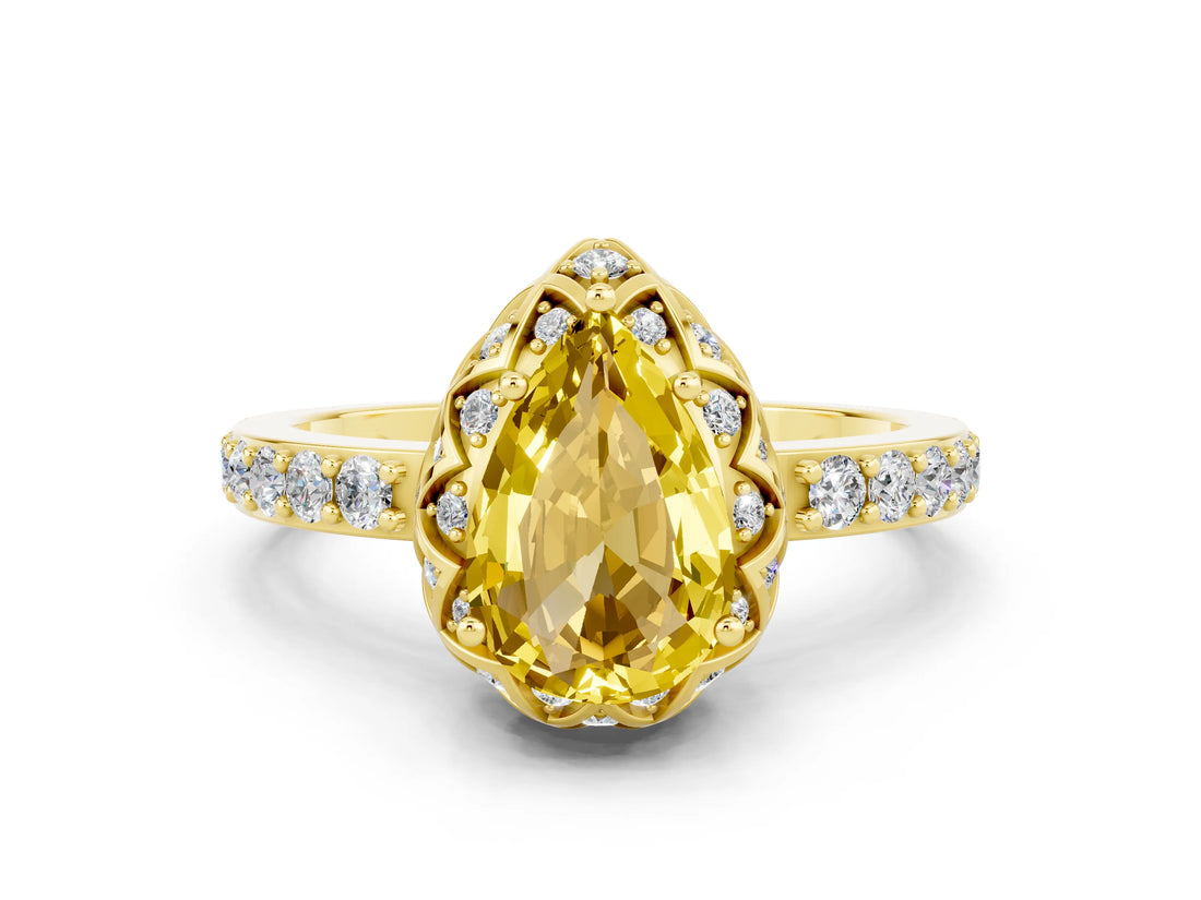 Yellow gold Pear Cut Diamond Solitaire Ring with Shared Prong Pavé Band