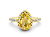 Yellow gold Pear Cut Diamond Solitaire Ring with Shared Prong Pavé Band