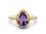 Yellow gold Pear Cut Diamond Solitaire Ring with Shared Prong Pavé Band
