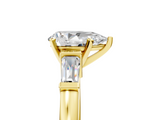 Yellow gold Pear Cut Diamond Solitaire Ring with Tapered Baguette Accents and Six-Prong Setting_79