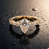 Yellow gold Pear Cut Diamond Solitaire with Side Stones, Pave Band, Four-Prong Setting_468