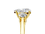 Yellow gold Pear Cut Diamond Three-Stone Engagement Ring with Prong Setting and Pavé Band_8