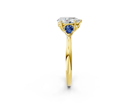Yellow gold Pear Cut Diamond Three-Stone Ring with Pear with Blue Sapphire side stone Side Stones and Prong Setting_2