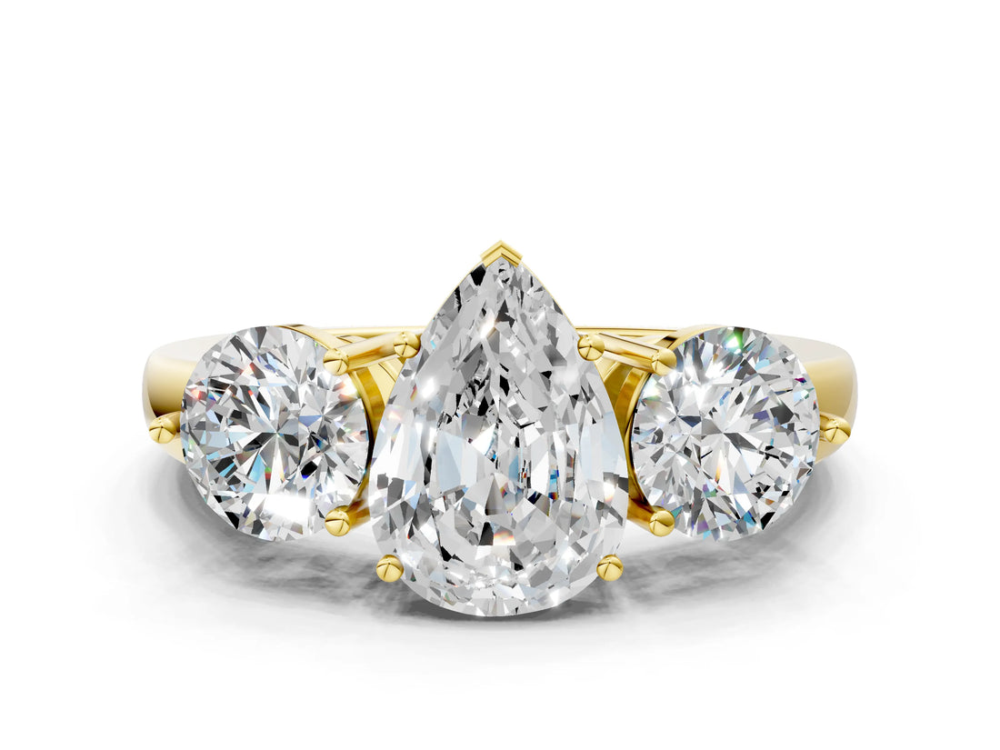 Yellow gold Pear Cut Diamond Three-Stone Ring with Prong Setting and Classic Band_149