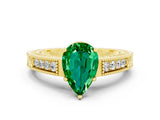 Yellow gold Pear Cut Emerald Engagement Ring with Milgrain Channel Set Band and Prong Setting
