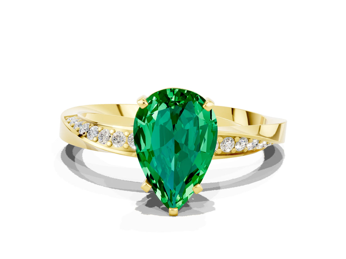 Yellow gold Pear Cut Emerald Engagement Ring with Side Stone Accents and Four-Prong Setting_60