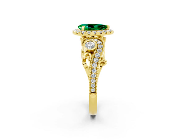 Yellow gold Pear Cut Emerald Halo Ring with Milgrain Pavé Band and Four-Prong Setting
