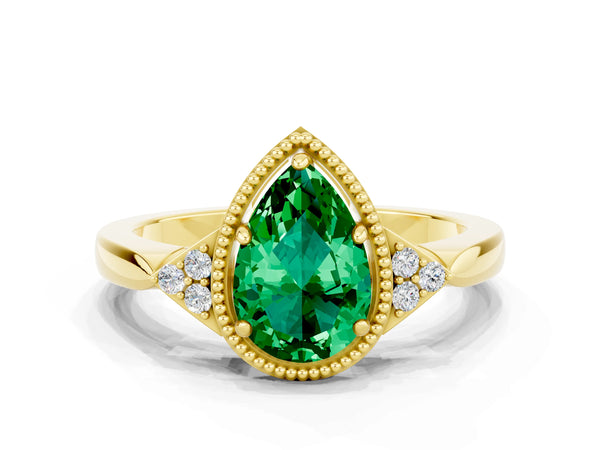 Yellow gold Pear Cut Emerald Halo Ring with Tapered Band and Four-Prong Setting