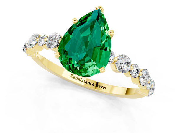 Yellow gold Pear Cut Emerald Prong Set Engagement Ring with Pavé Band