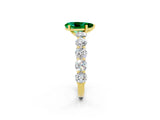 Yellow gold Pear Cut Emerald Prong Setting with Side Stones on a Pave Band_2