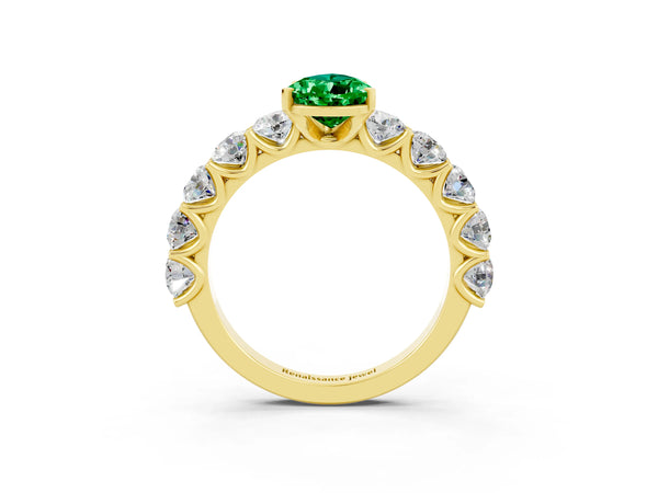 Yellow gold Pear Cut Emerald Prong Setting with Side Stones on a Pave Band