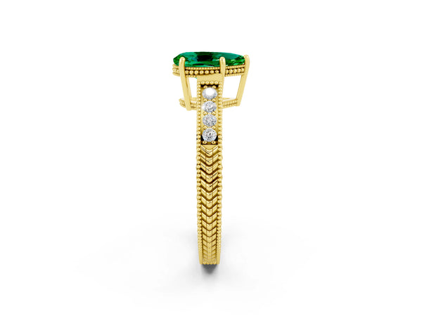 Yellow gold Pear Cut Emerald Ring with Milgrain Pavé Band and Four-Prong Setting