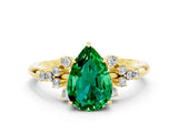 Yellow gold Pear Cut Emerald Ring with Side Stones and Four-Prong Setting_36