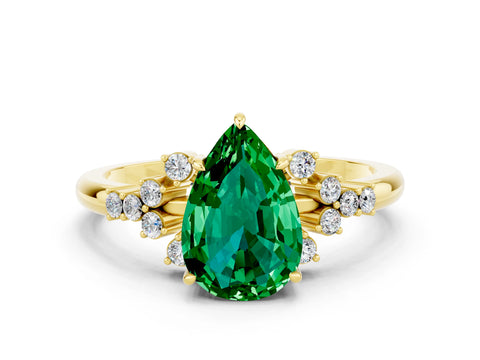 Yellow gold Pear Cut Emerald Ring with Side Stones and Four-Prong Setting_36