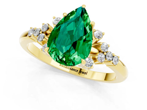 Yellow gold Pear Cut Emerald Ring with Side Stones and Four-Prong Setting_37