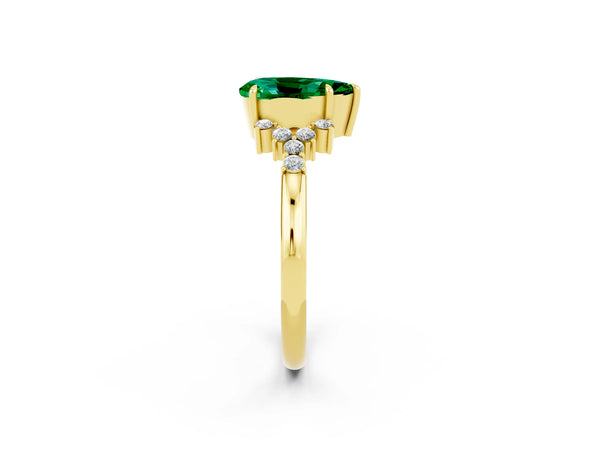 Yellow gold Pear Cut Emerald Ring with Side Stones and Four-Prong Setting