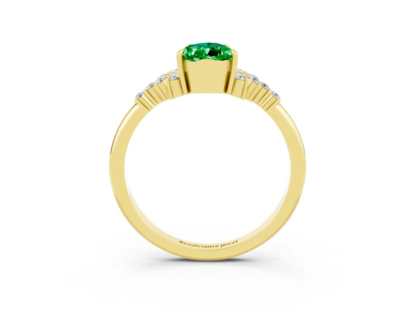 Yellow gold Pear Cut Emerald Ring with Side Stones and Four-Prong Setting