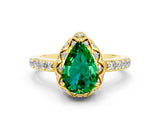 Yellow gold Pear Cut Emerald Scalloped Halo Engagement Ring with Round Shared Prong Band_24